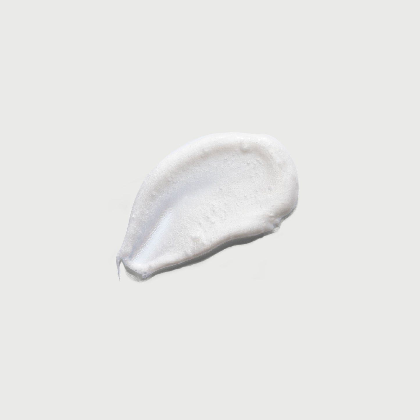 the-smoother-glycolic-acid-exfoliating-body-wash-i9 NATR-40002-Swatch-The-Smoother-Glycolic-Acid-Exfoliating-Body-Wash-bonebkgd.jpg