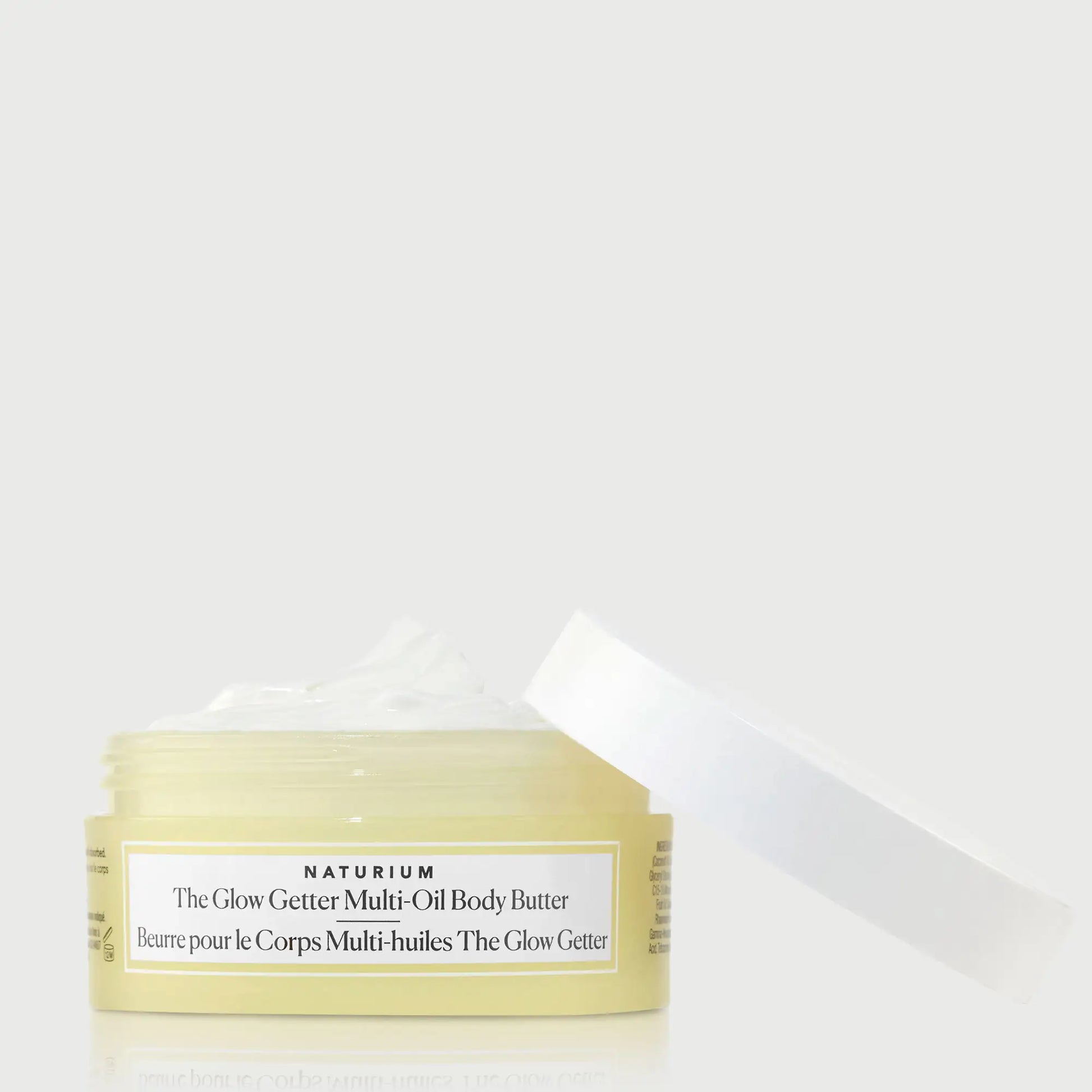 the-glow-getter-multi-oil-body-butter-travel-size-d4 NATR-40115_Glow-Getter-Body-Butter-Mini_front_capoff_bonebkgd.webp